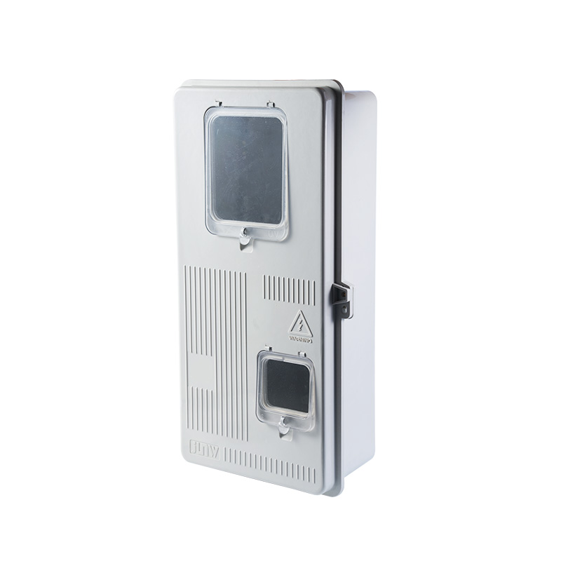 White three-phase electric meter box with two transparent windows, ventilation slots, warning symbol, and JUNW branding on the front.
